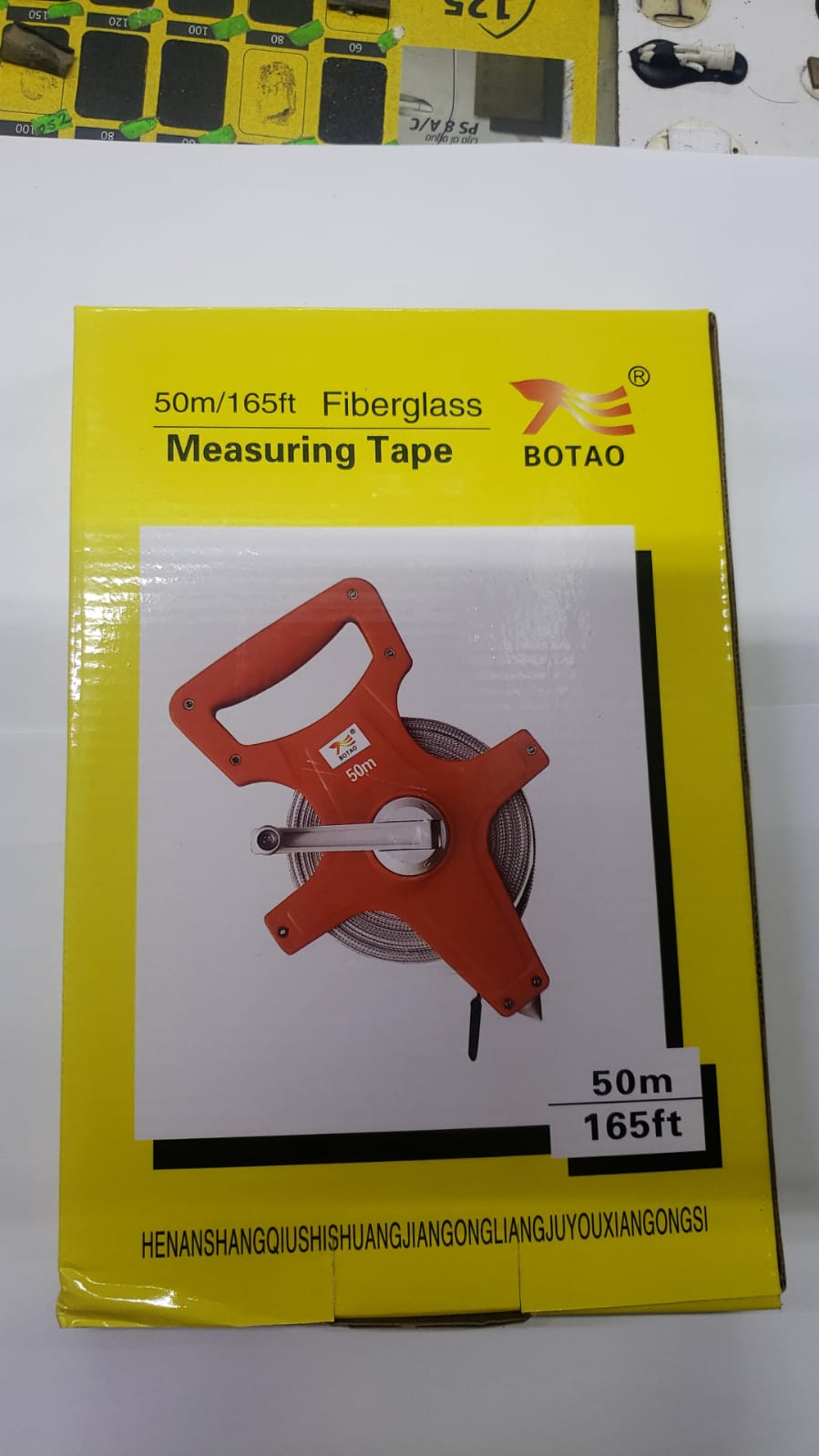 WINCHA 50 METROS AMARILLO C/MANGO