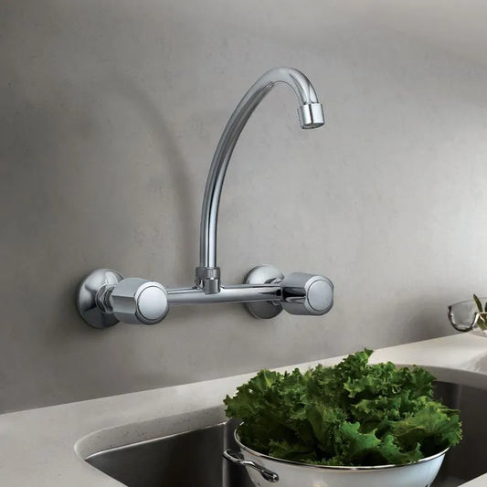 CAÑO MEZCLADORA COCINA PARED PERILLA METAL "VAINSA"