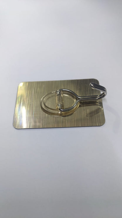 PERCHERO ADHESIVO MULTIUSO REFORZADOR DORADO ( x und )