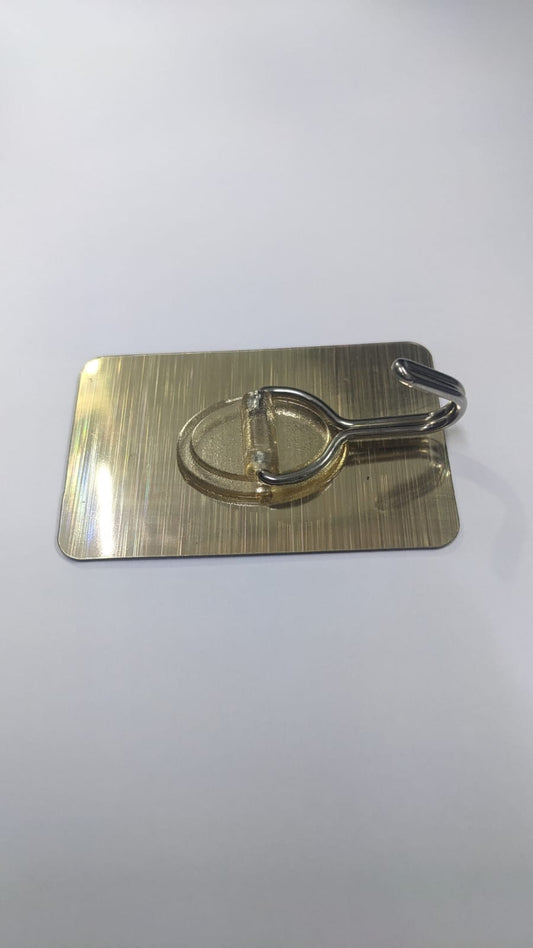 PERCHERO ADHESIVO MULTIUSO REFORZADOR DORADO ( x und )